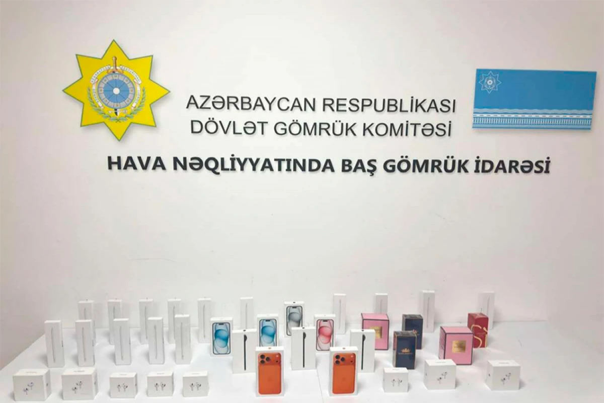 Mobil telefonları [[sərnişinlərə paylayaraq]] ölkəyə keçirməyə cəhd aşkarlandı