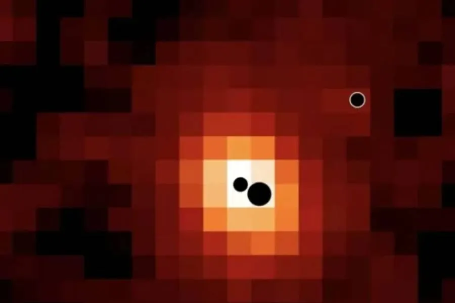 Three supermassive black holes found in a distant galaxy—and they may collide